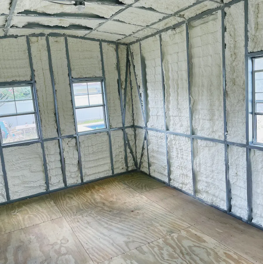 Closed-cell spray foam insulation applied to wall cavities in a residential project in Carpentersville
